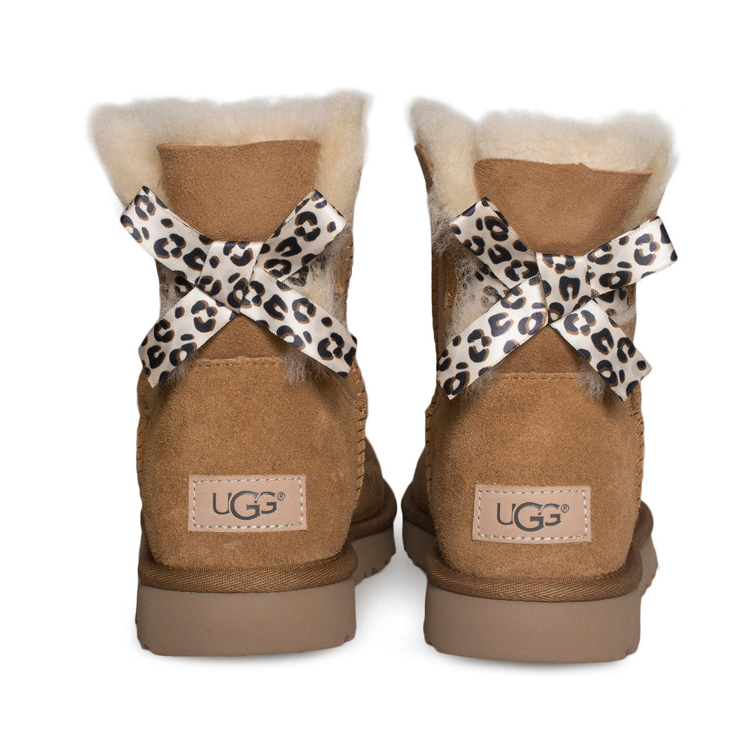 Ugg sheep skin hot cheetah print Bailey bow tan warm boots size 2