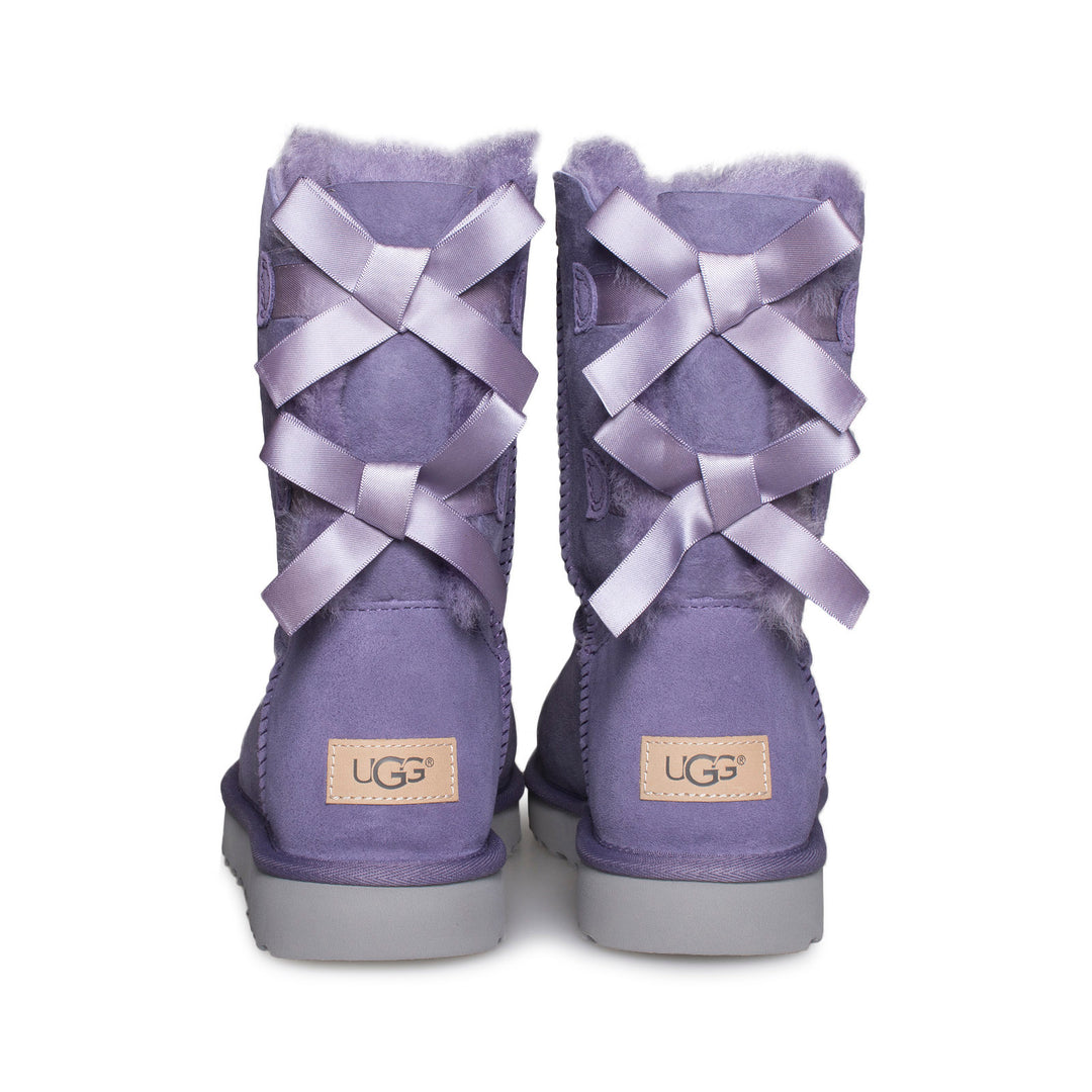 Purple uggs with bows hotsell